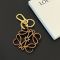 Loewe Anagram Charm In Calfskin Brown