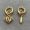 Loewe Mismatched Anagram Hoop Earrings In Metal Gold